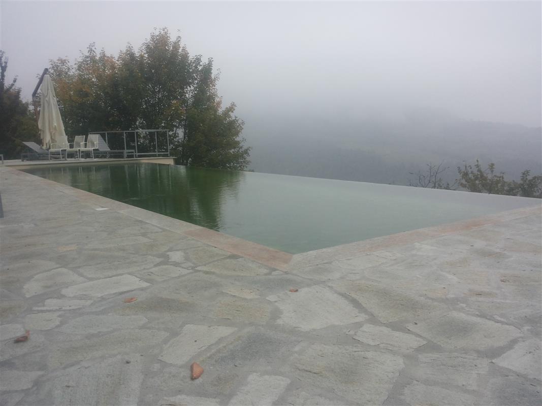 Pavimento e bordo per piscina in Pietra Luserna Naturale n°37